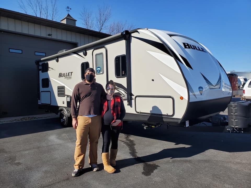 Amber and her husband purchasing her first travel trailer in November of 2021 (while pregnant with her 3rd child).